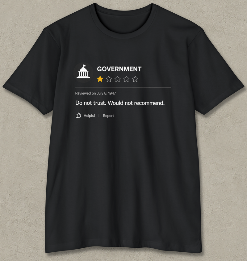 A black short-sleeve t-shirt with a white graphic print resembling a review rating for 'GOVERNMENT', featuring a star rating of 1 out of 4 and the text 'Do not trust. Would not recommend.
