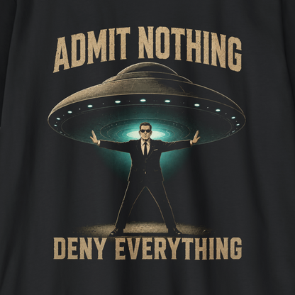 A close-up of a black graphic print featuring a man in a black suit standing in front of a UFO with the text 'ADMIT NOTHING' above and 'DENY EVERYTHING' below in a distressed beige font.