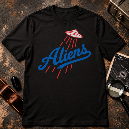 Alien Baseball Shirt design with blue Aliens script, white UFO outlined in red, and red beam lines on a black background