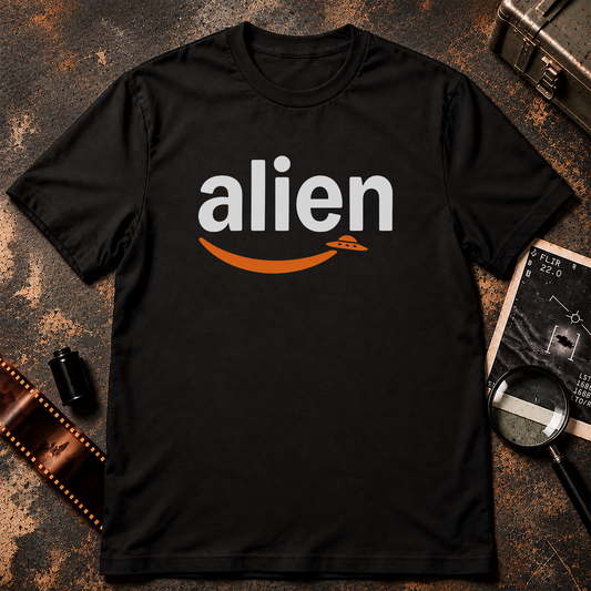 ALIEN parody shirt design featuring white lowercase alien lettering with an orange smile-shaped arrow ending in a small flying saucer on a black background.
