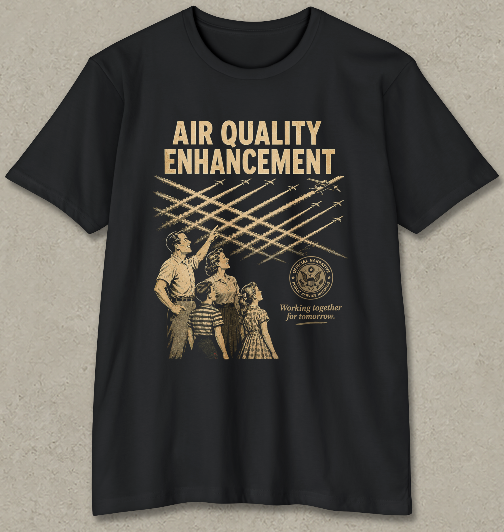 A black short-sleeve crewneck t-shirt with a vintage-style graphic print in tan. The graphic features the text 'AIR QUALITY ENHANCEMENT' above an illustration of people looking up at airplane contrails, with a circular seal and the text 'Working together for clean air'.