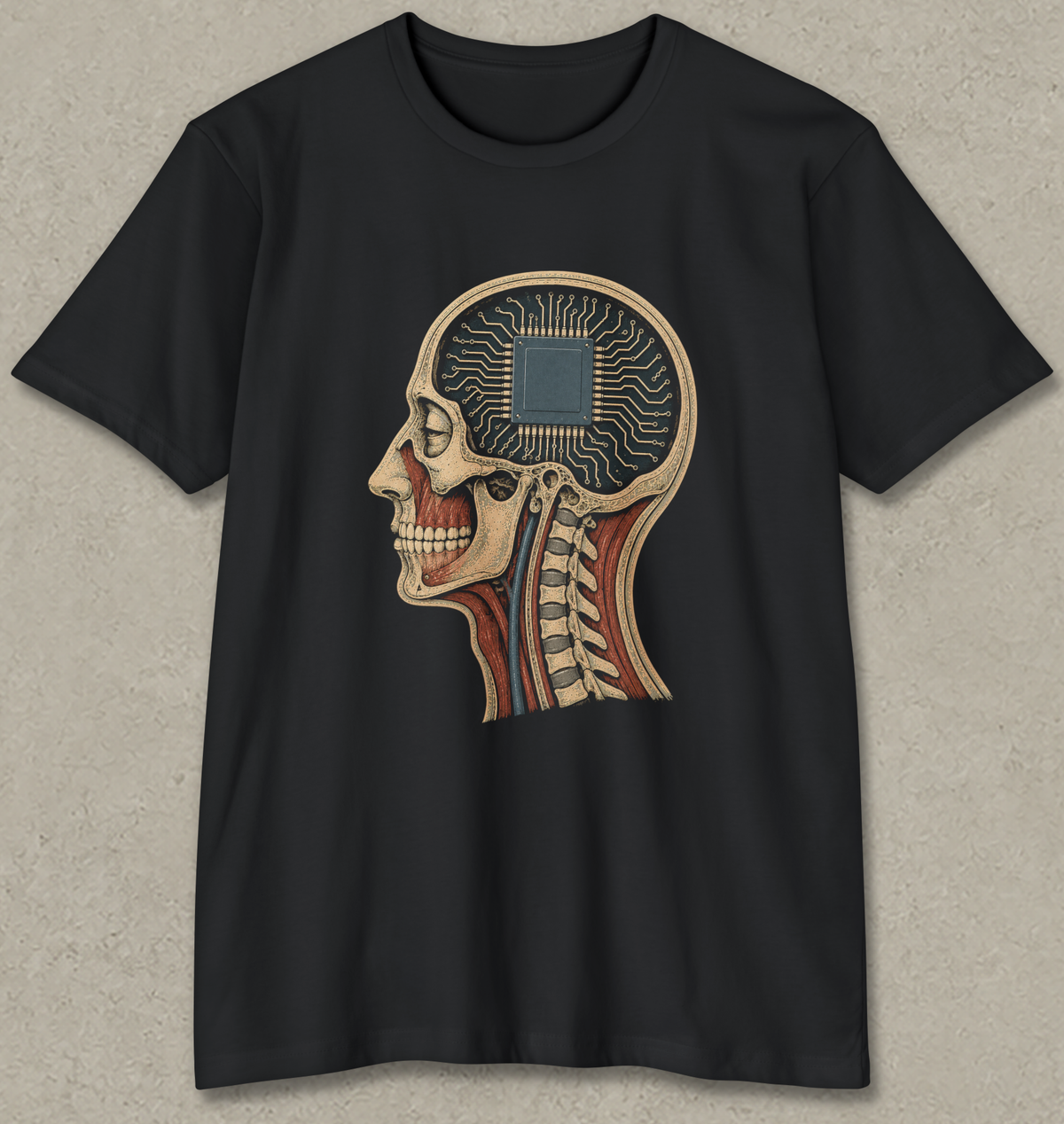 A black short-sleeve crewneck t-shirt featuring a detailed graphic of a human skull in profile with anatomical muscle and bone details, and a circuit board chip design inside the head, displayed against a textured light gray background.