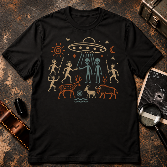 Ancient cave painting style artwork showing grey aliens meeting primitive humans beneath a UFO, surrounded by animals, stars, sun, and moon symbols.