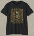 A black short-sleeve crewneck t-shirt featuring a graphic print of a small alien figure surrounded by a circular pattern of golden-yellow weed-like leaves, displayed flat against a textured light gray background.