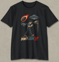 A black short-sleeve t-shirt with a graphic print of a man walking under a security camera and UFO, with a burning rocket and the text 'DON'T LOOK UP' in red and beige.