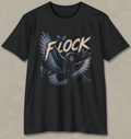 A black short-sleeve crewneck t-shirt featuring a graphic print of a flock of blue and white birds with the word 'FLOCK' in a stylized cream and blue font across the chest, displayed against a textured gray background.
