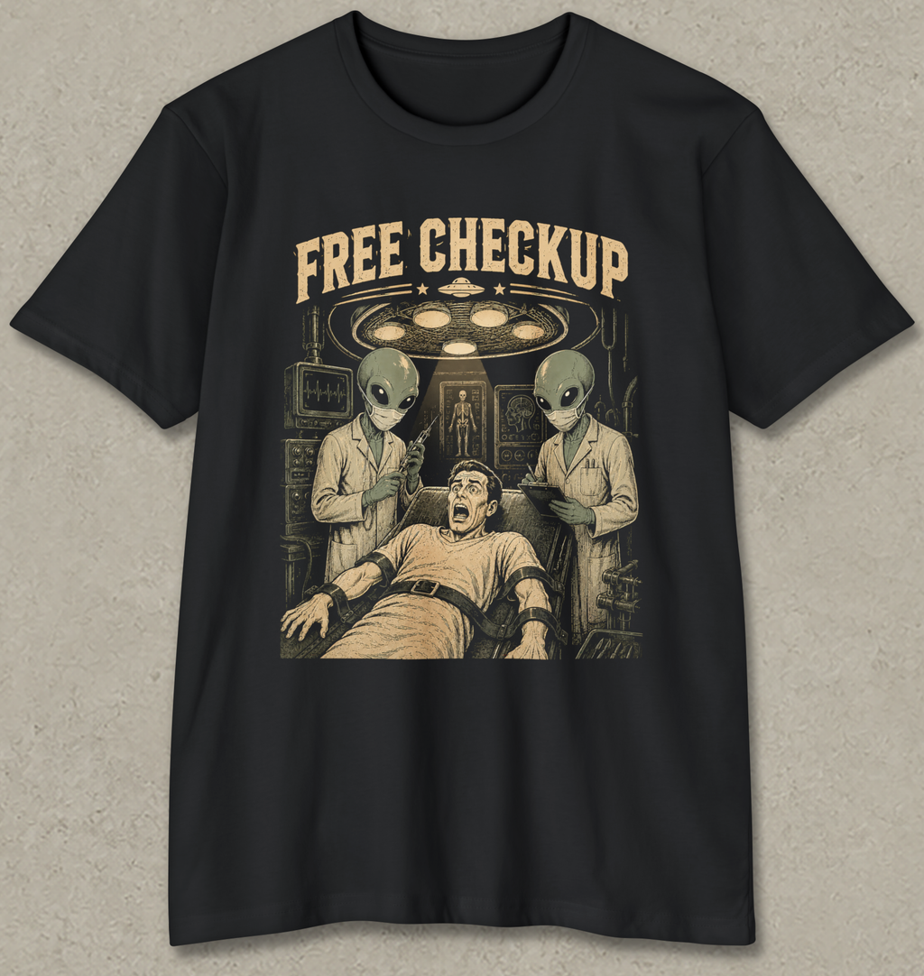 A black short-sleeve crewneck t-shirt with a vintage-style graphic print on the front. The graphic features the text 'FREE CHECKUP' in a distressed beige font above an illustration of a man in a hospital gown surrounded by two green-skinned aliens under a surgical light.