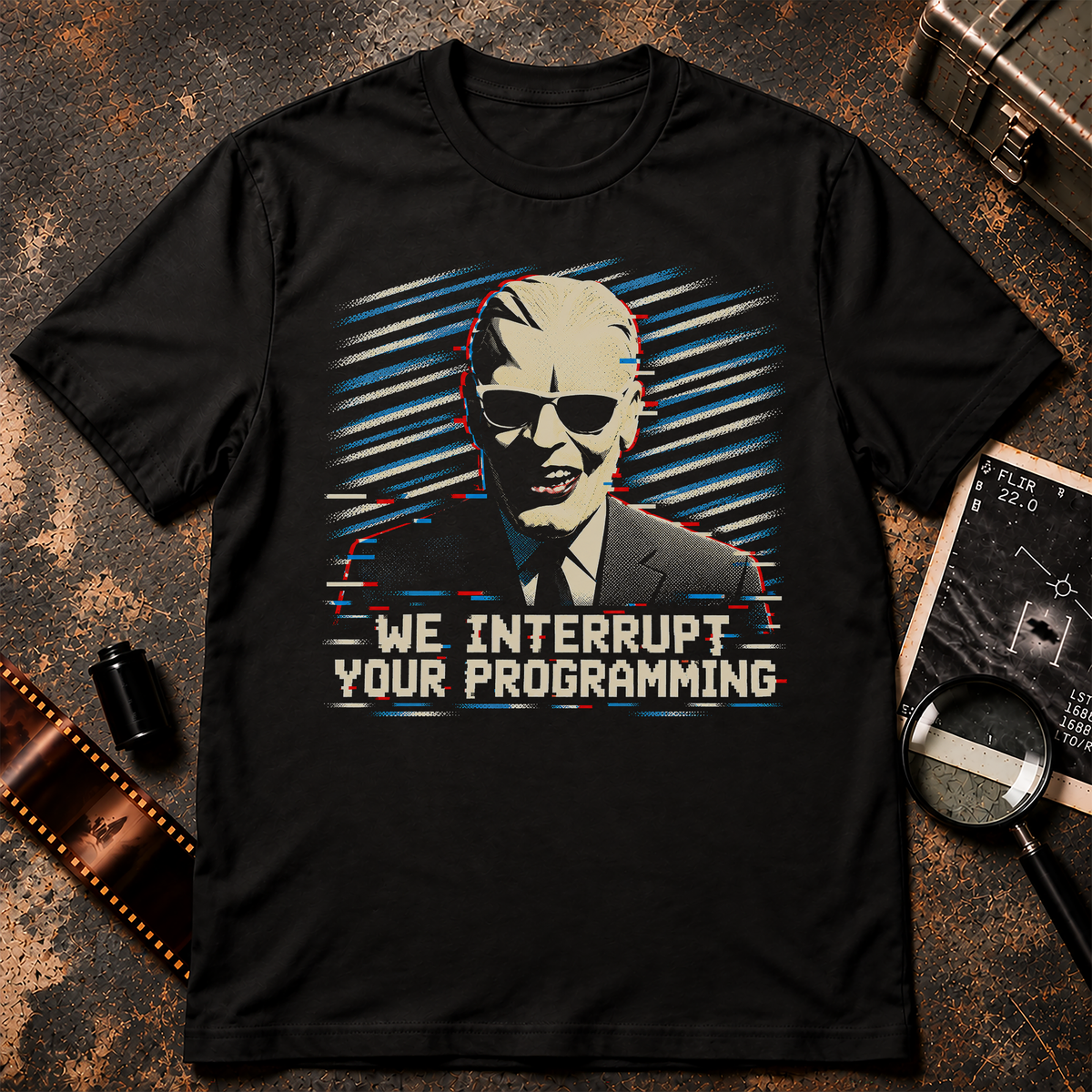 TV Hijacking Shirt with retro broadcast intruder, analog glitch effects, and We Interrupt Your Programming text