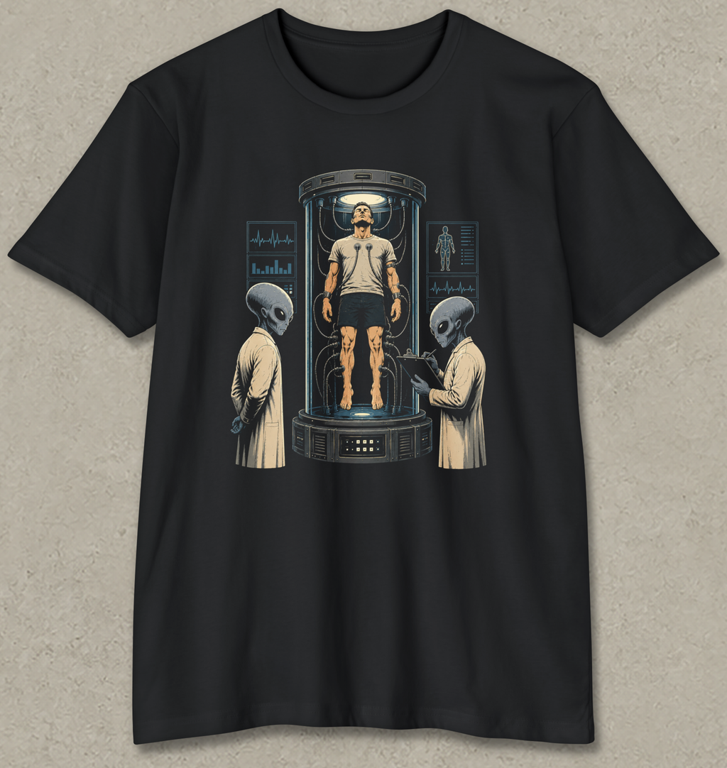 A black short-sleeve crewneck t-shirt with a detailed sci-fi graphic print on the front, featuring a man inside a futuristic glass pod flanked by two aliens, displayed against a textured gray background.