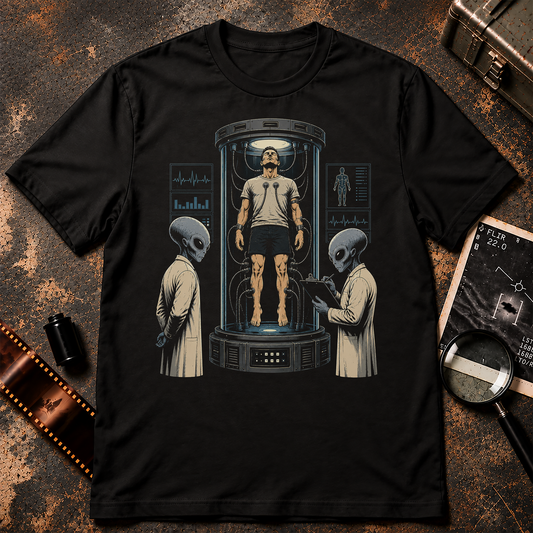 Human test subject suspended inside a futuristic laboratory chamber while two grey alien scientists observe and record the experiment.