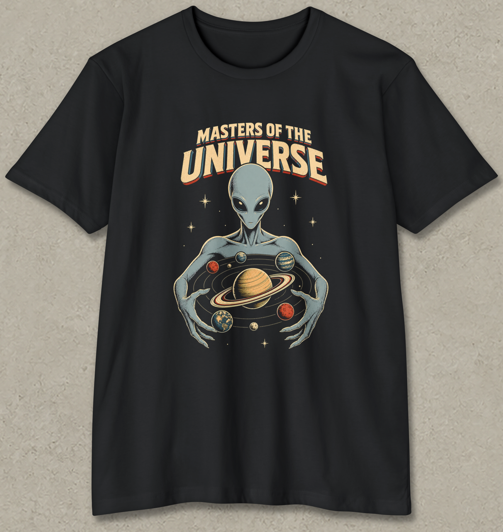 A black short-sleeve crewneck t-shirt with a retro sci-fi graphic of a gray alien holding planets, with the text 'MASTERS OF THE UNIVERSE' above it, displayed on a textured gray background.