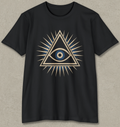 A black short-sleeve crewneck t-shirt featuring a central graphic of an all-seeing eye inside a triangle with radiating spikes, detailed in gold, blue, and white, displayed against a textured gray background.