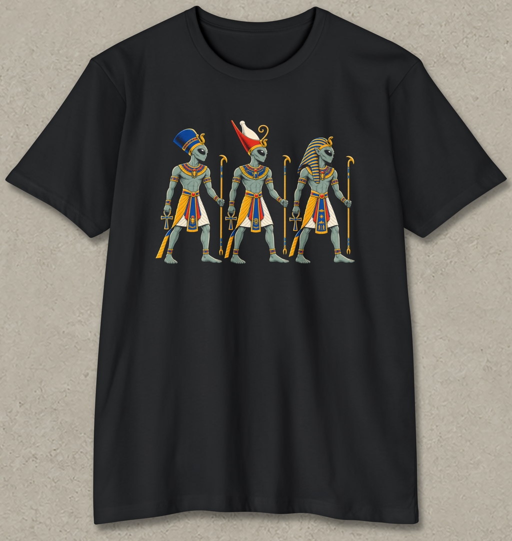 A black short-sleeve crewneck t-shirt with a graphic print of three ancient Egyptian figures in headdresses and robes, displayed flat against a textured gray background.