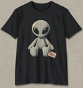 A black short-sleeve crewneck t-shirt featuring a graphic of a stitched gray alien sitting in the center, holding a small tag that reads 'MADE IN ROSWELL'.