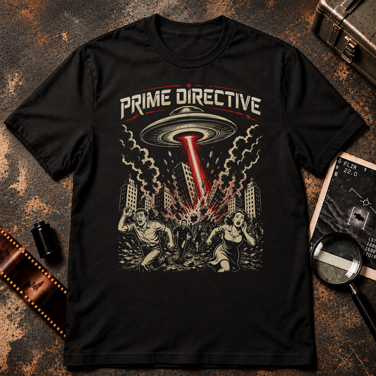 PRIME DIRECTIVE shirt design featuring a large flying saucer firing a red beam into a city as frightened people flee through the streets, illustrated in a retro science fiction comic style.