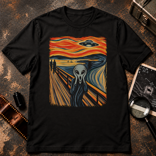 The Scream inspired graphic featuring a frightened grey alien holding its face on a bridge while a flying saucer hovers in a swirling orange sky.