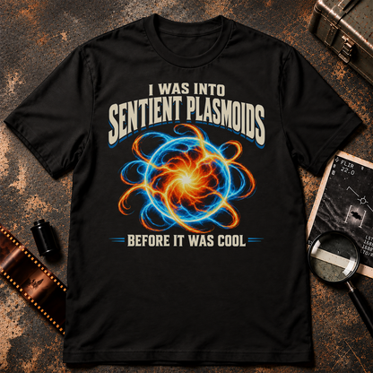 Sentient Plasmoids Shirt featuring a glowing blue and orange plasma orb with cream retro lettering reading I Liked Sentient Plasmoids Before It Was Cool.