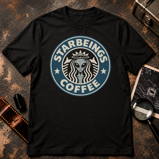 STARBEINGS COFFEE alien shirt design featuring a grey alien with a flying saucer crown inside a retro blue-grey and cream circular coffee emblem.