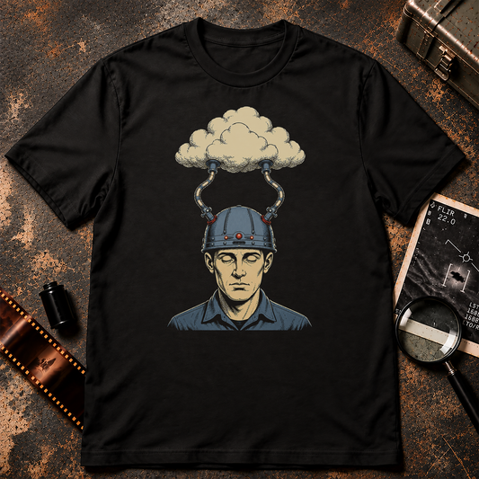 THE CLOUD shirt graphic featuring a man wearing a retro-futuristic helmet connected by two mechanical cables to a large cloud above his head, illustrated in cream and blue-gray on black.