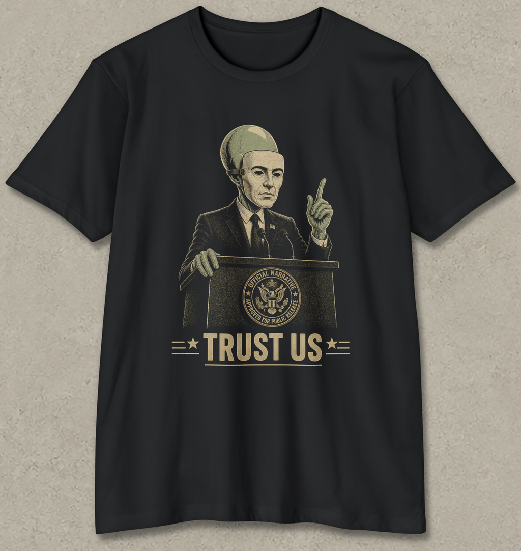 A black short-sleeve t-shirt with a vintage-style graphic of a man in a suit and cap speaking at a podium with the text 'TRUST US' and a U.S.