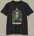 A black short-sleeve crewneck t-shirt featuring a graphic print of a blue and gold parrot inside a gold birdcage with a security camera on its head, displayed against a textured gray background.