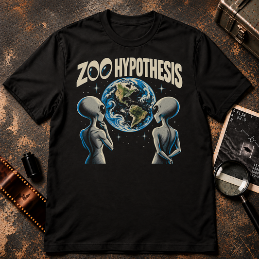 Zoo Hypothesis Shirt graphic featuring two grey aliens observing planet Earth with vintage cream lettering and retro blue sci-fi comic styling.